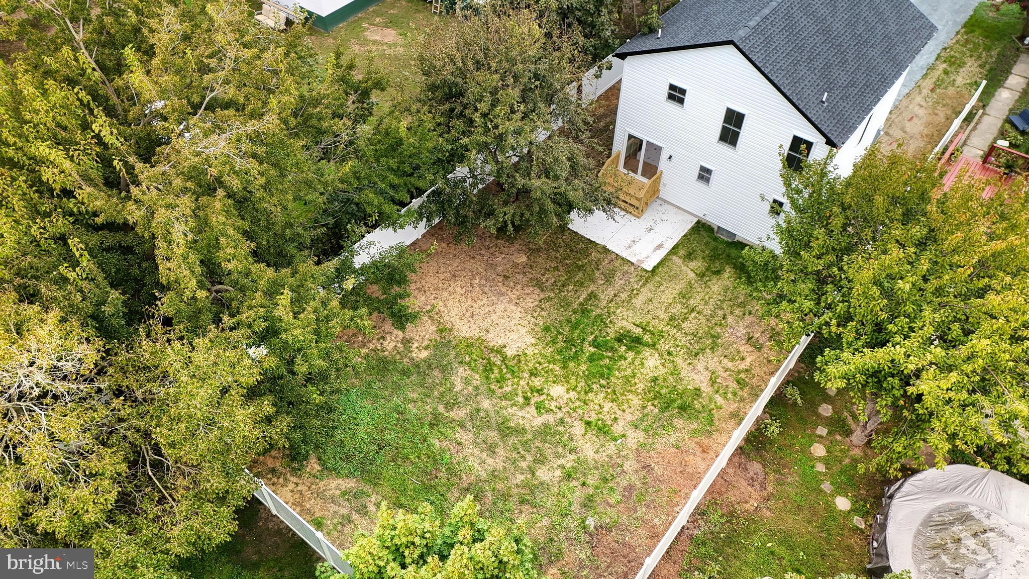 99 Cooper Street Kenton, DE 19938 - Photo 33 of 43 view of a house with a yard and a large tree
