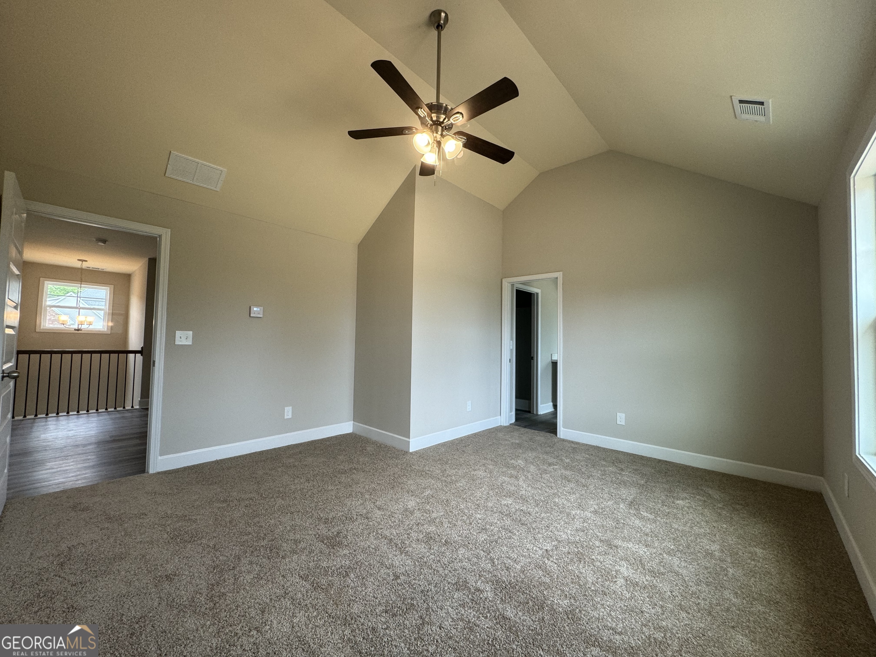 166 Country World Drive Macon, GA 31211 - Photo 31 of 33 a view of an empty room with a ceiling fan