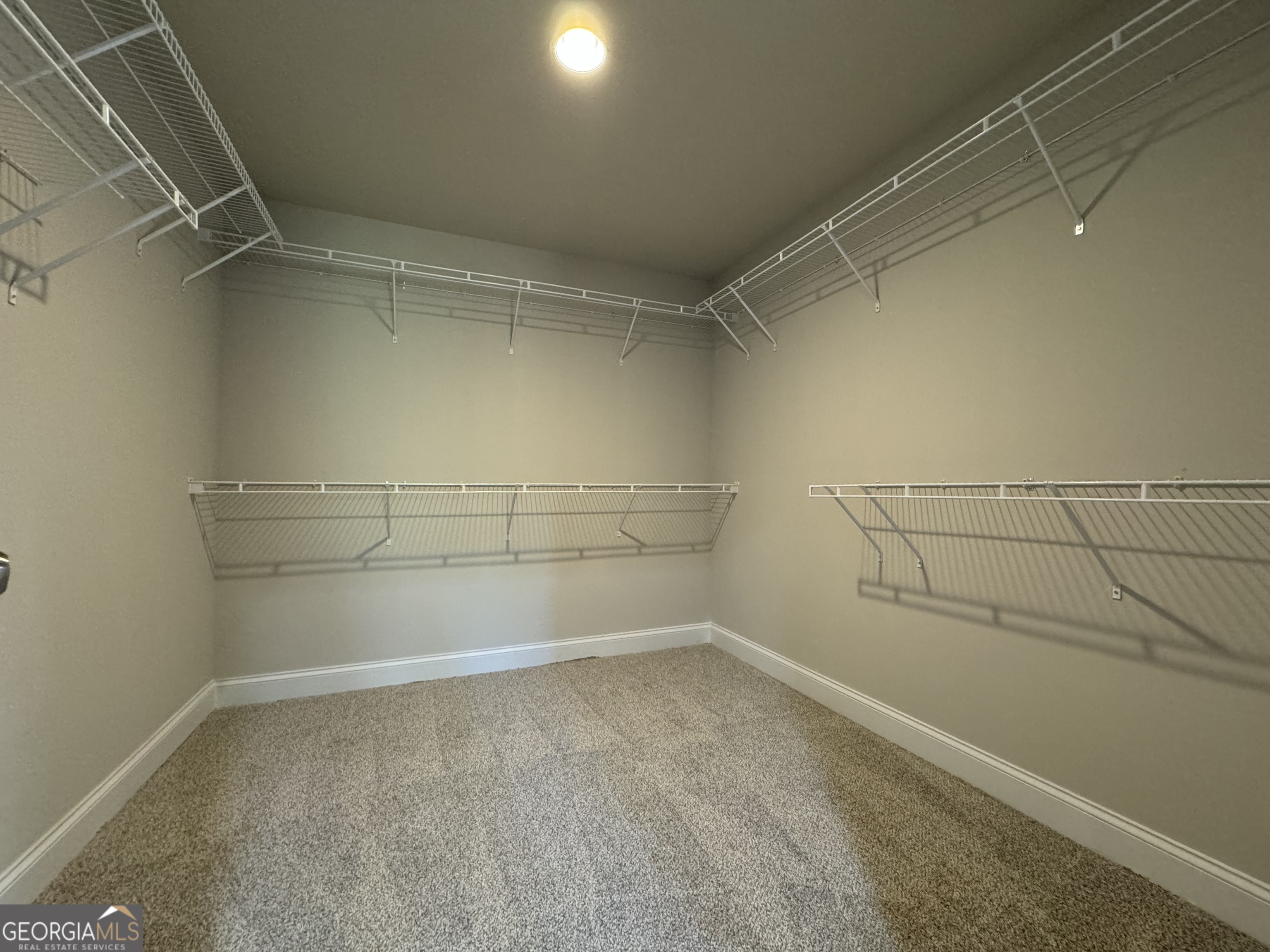 166 Country World Drive Macon, GA 31211 - Photo 10 of 33 a view of a room with empty racks