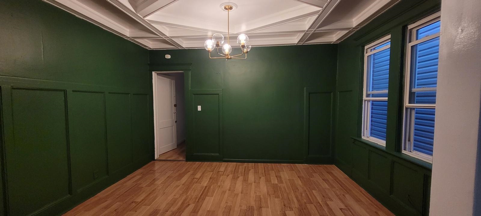 69 Poplar Street Jersey City, NJ 07307 - Photo 3 of 13 a view of a livingroom with a chandelier