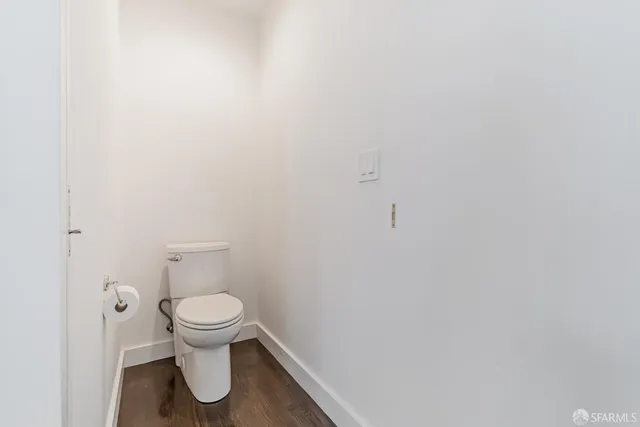 a bathroom with a bathtub and a toilet