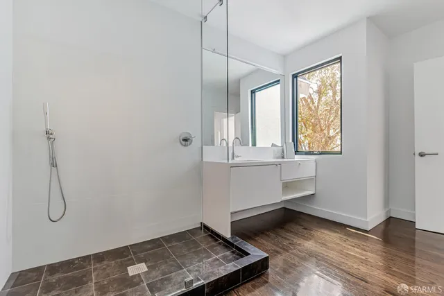 a bathroom with a sink and a mirror