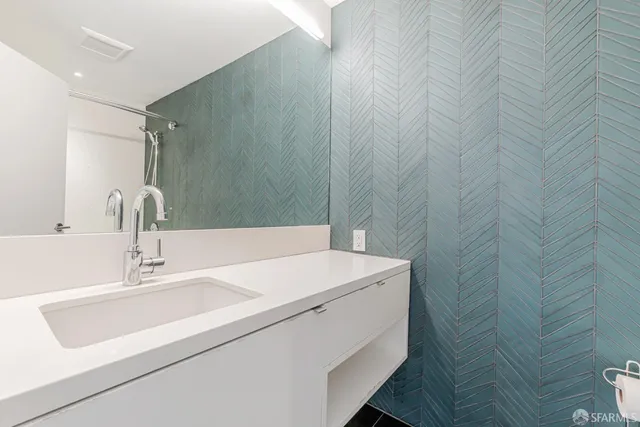 a bathroom with a shower and toilet