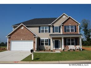 129 Roanoke Road Fletcher, NC 28732 - Photo 1 of 1 a front view of a house with a yard