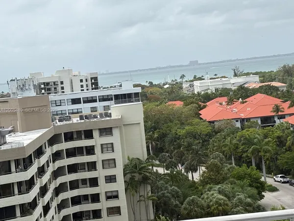 a view of a city with tall buildings