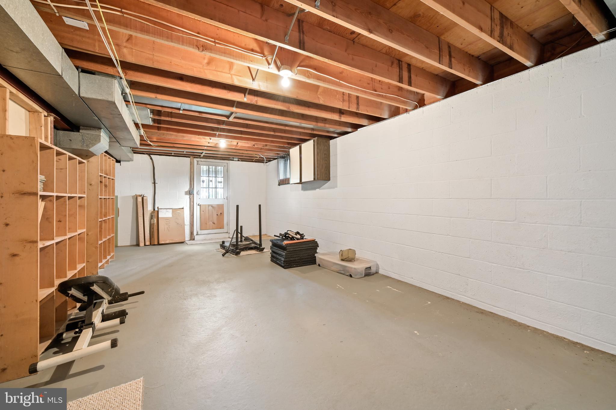 1012 West Joppa Road Towson, MD 21204 - Photo 29 of 32 Unfinished area on lower level w/loads of storage