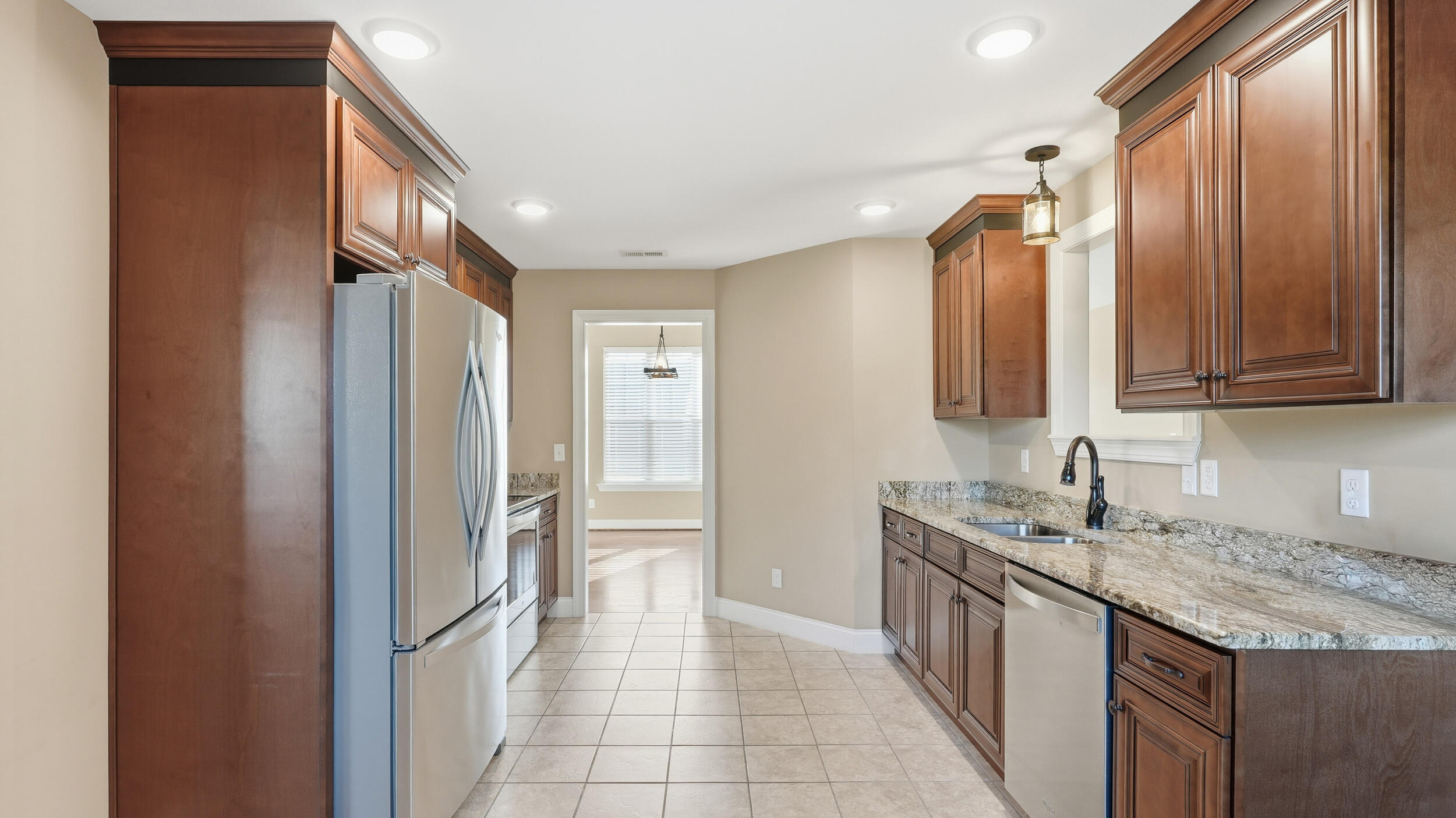 136 Ginger Lake Drive Rock Spring, GA 30739 - Photo 12 of 38 Kitchen view into separate dining room