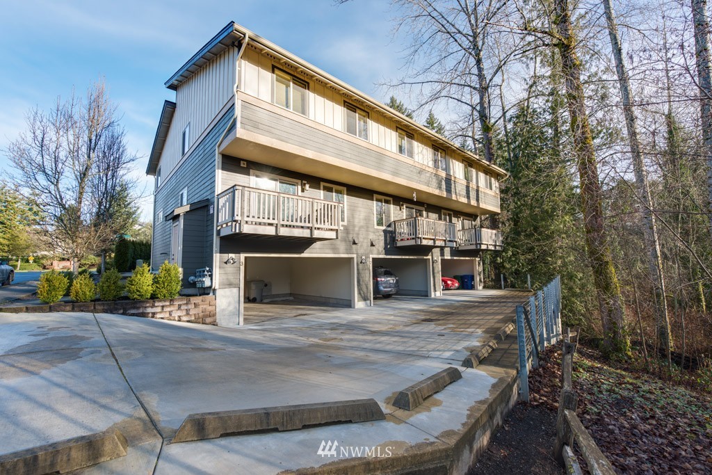 4821 Northeast Sunset Boulevard Renton, WA 98059 - Photo 2 of 12 a view of a house with roof and sitting area