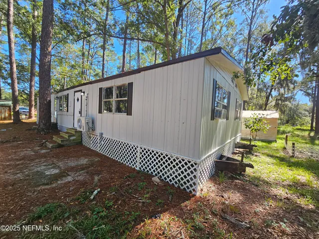 a backyard of a house with a yard