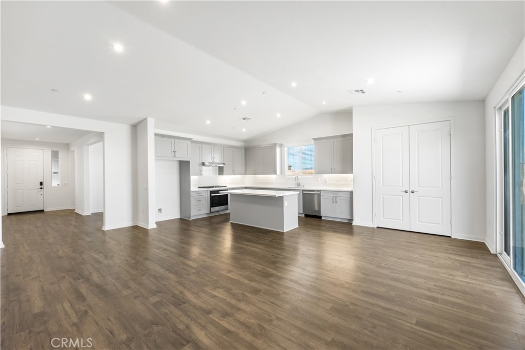 41846 Castello Lane Palmdale, CA 93552 - Photo 15 of 46 a view of a kitchen with furniture and wooden floor