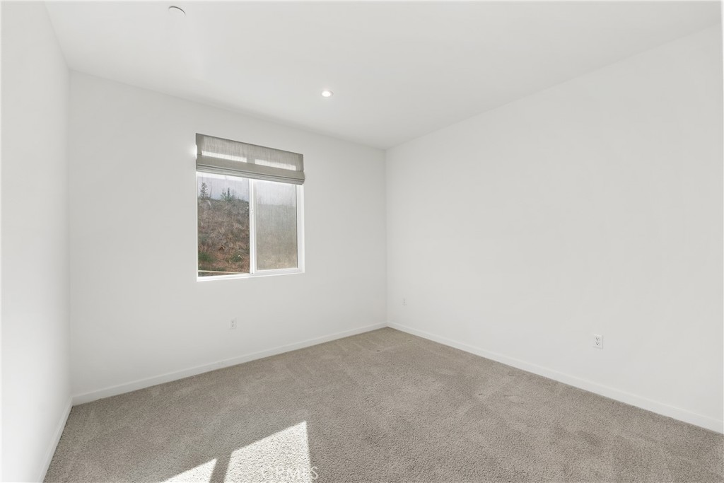 41846 Castello Lane Palmdale, CA 93552 - Photo 26 of 46 an empty room with a window