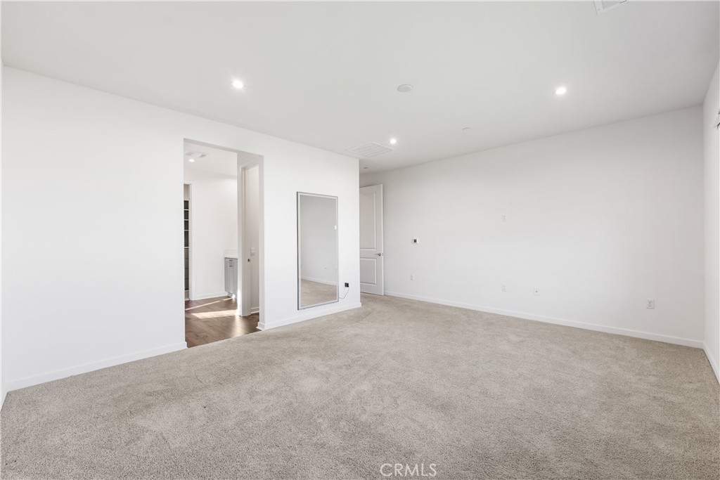 41846 Castello Lane Palmdale, CA 93552 - Photo 31 of 46 an empty room with closet and a window