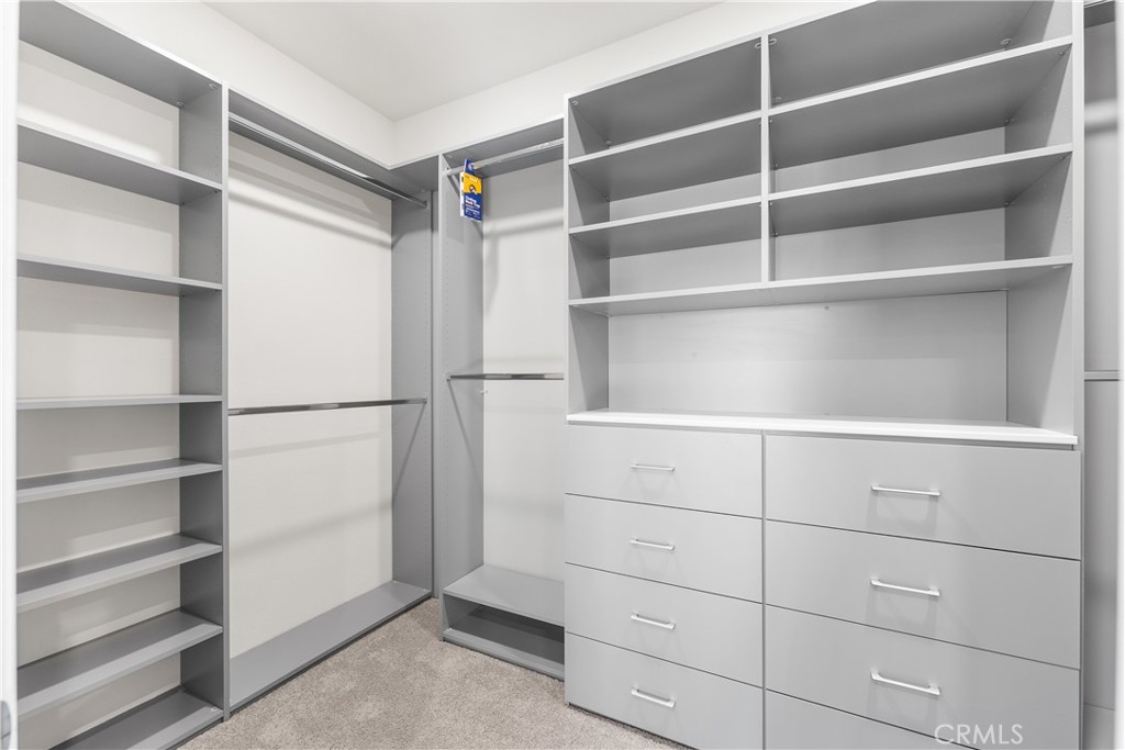 41846 Castello Lane Palmdale, CA 93552 - Photo 37 of 46 a view of walk in closet with empty racks