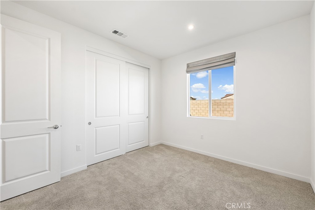 41846 Castello Lane Palmdale, CA 93552 - Photo 43 of 46 a view of an empty room and a window