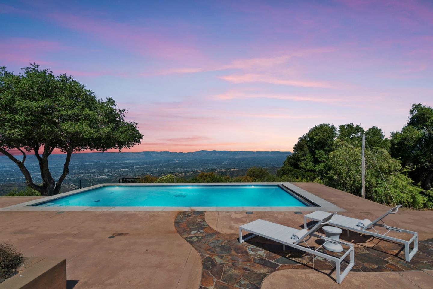 15060 Montebello Road Cupertino, CA 95014 - Photo 23 of 82 a view of yard with swimming pool and green space