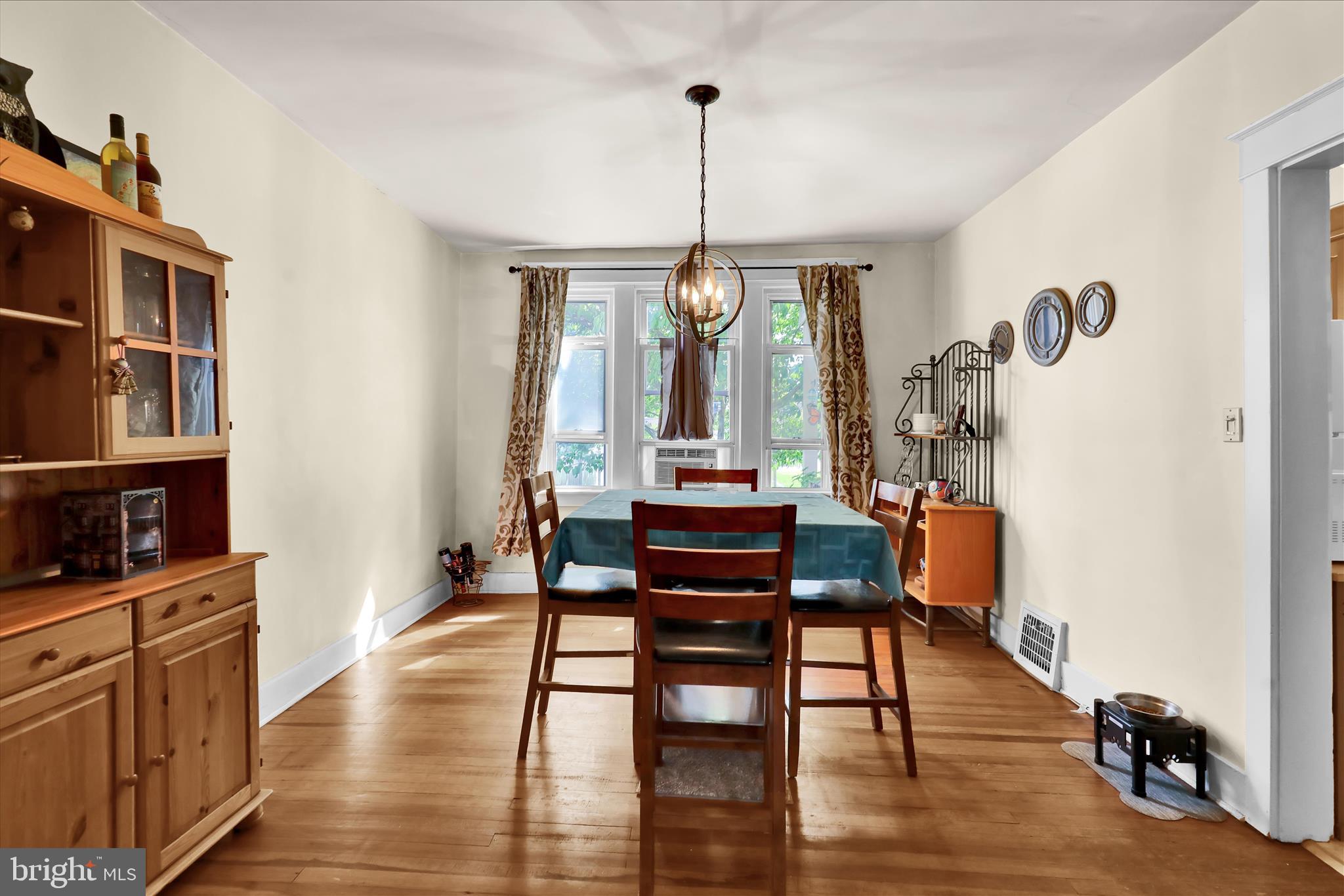 43 East Walnut Street Ephrata, PA 17522 - Photo 9 of 32 a view of a dining room with furniture window and wooden floor