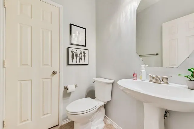 a kitchen with cabinets and window