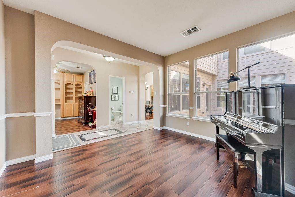 5404 Worley Drive The Colony, TX 75056 - Photo 6 of 30 a view of a livingroom with furniture and wooden floor