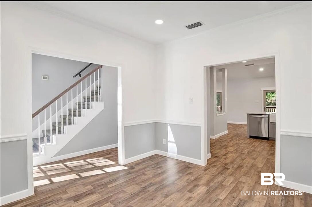 632 Ridgewood Drive Daphne, AL 36526 - Photo 6 of 36 Spare room featuring hardwood / wood-style floors