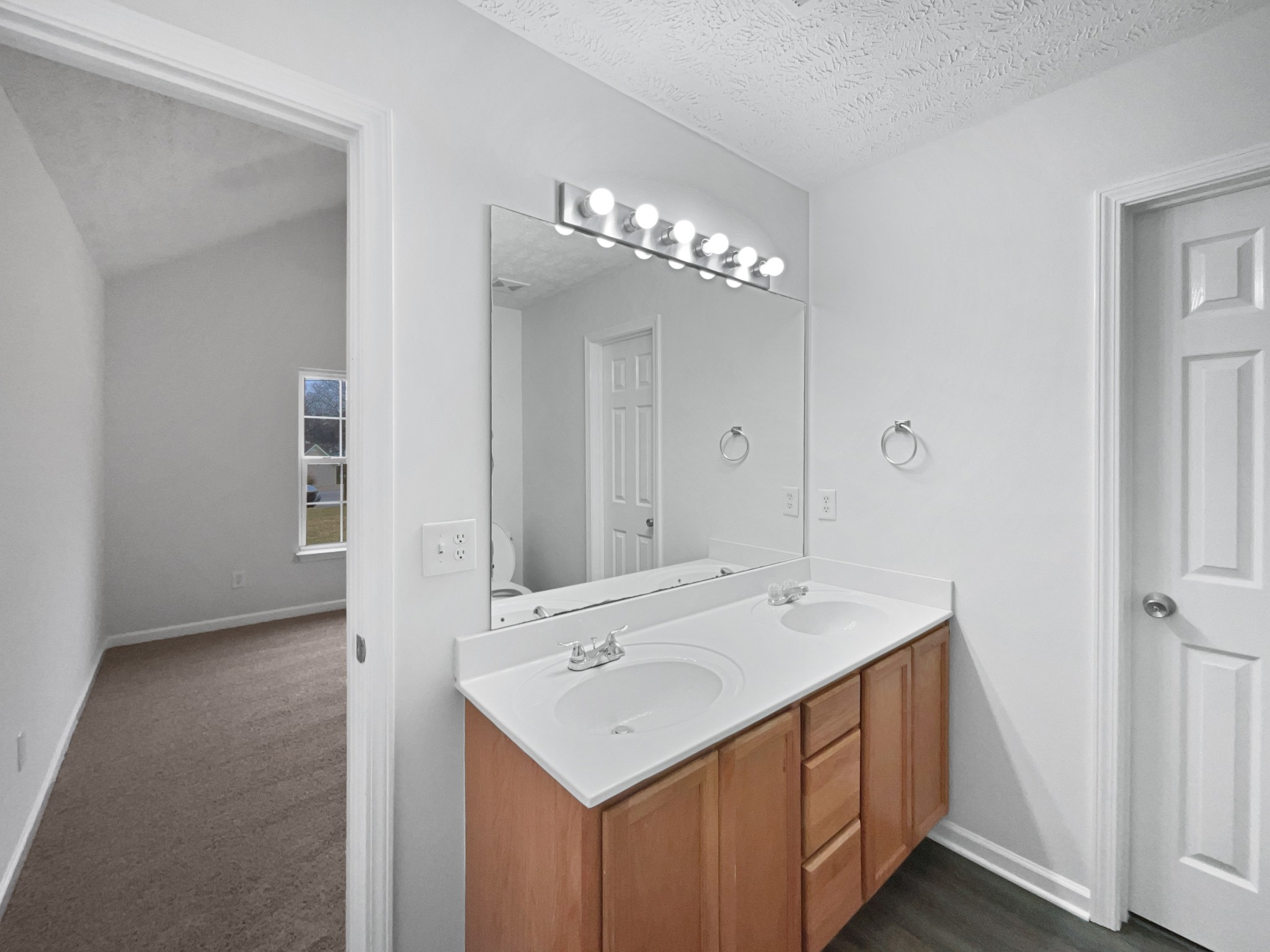 760 Autumn Ridge Lane Columbia, TN 38401 - Photo 13 of 19 a bathroom with a sink and a mirror
