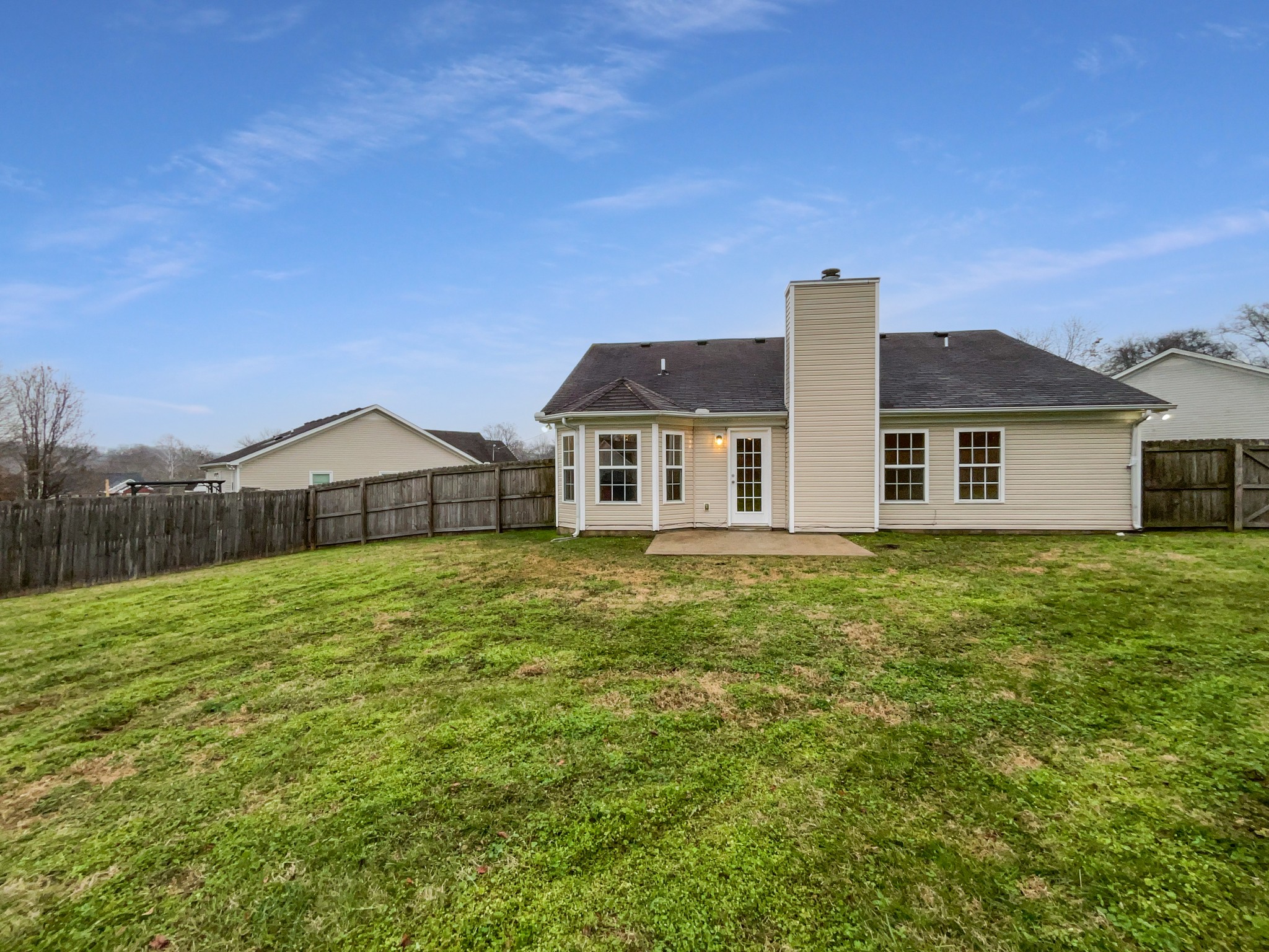 760 Autumn Ridge Lane Columbia, TN 38401 - Photo 15 of 19 a front view of a house with a garden
