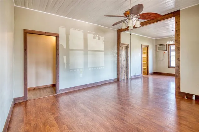 a view of a livingroom with wooden floor