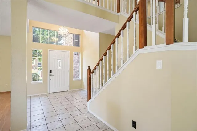 a view of an entryway with staircase