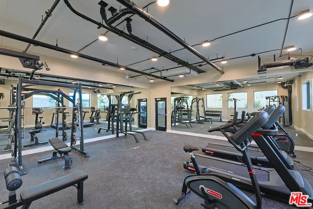 a view of a room with gym equipment