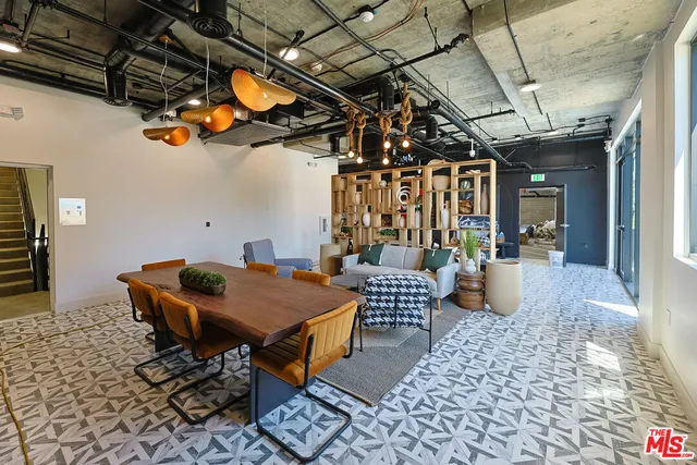 a view of a hallway with washer and dryer