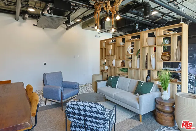 a kitchen with a sink cabinets and stainless steel appliances