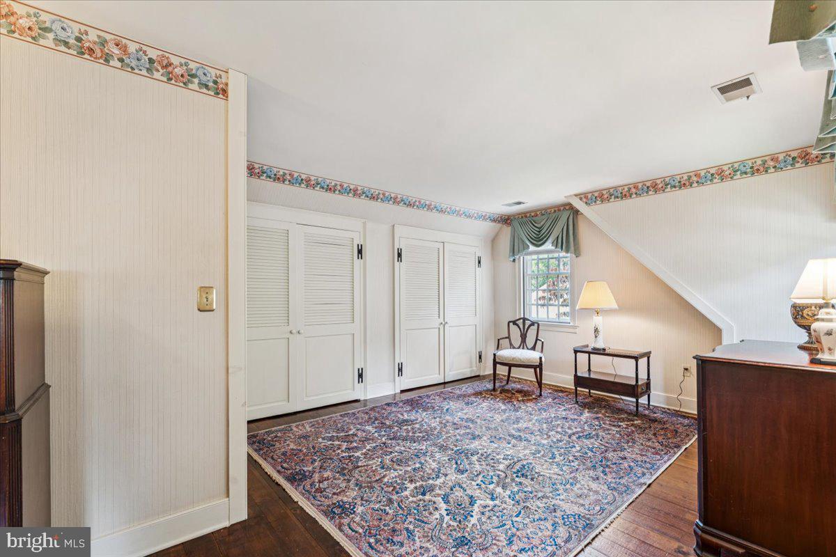 356 Broadview Lane Annapolis, MD 21401 - Photo 33 of 48 a living room with furniture and a rug