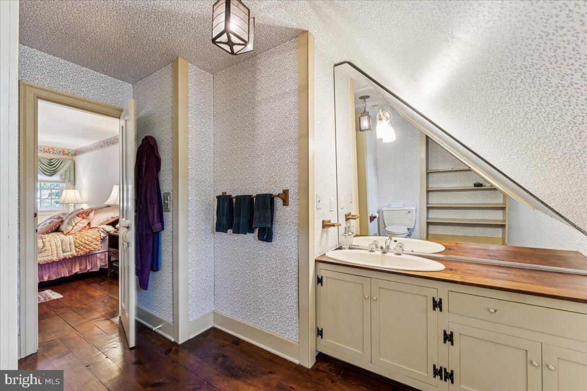 356 Broadview Lane Annapolis, MD 21401 - Photo 35 of 48 a en suite bathroom with a sink and a mirror
