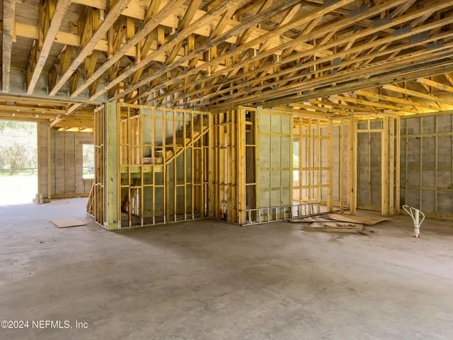 a view of an empty room with a sliding door