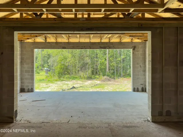 a picture of a room with a white wall and white walls