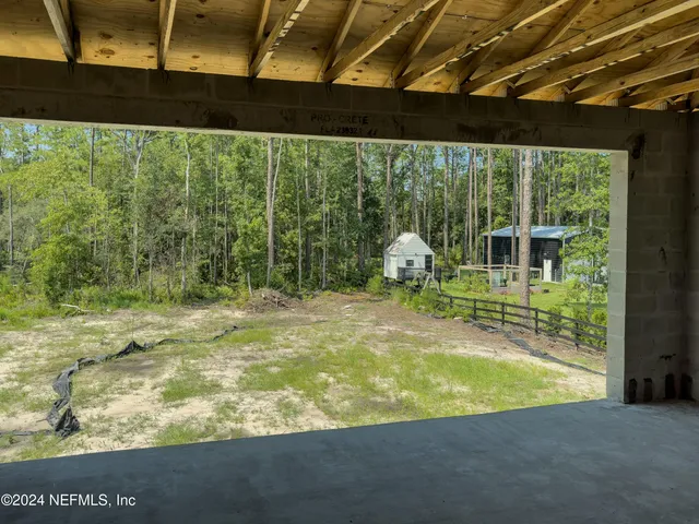 a picture of a bathroom with a shower