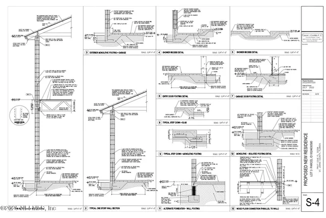 an aerial view of residential houses with yard