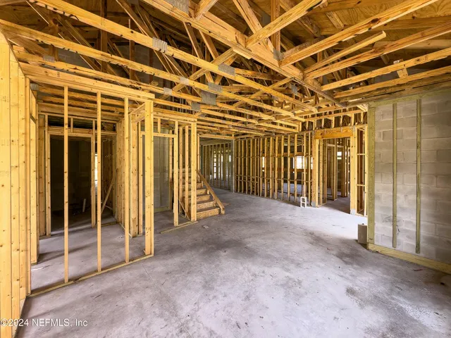 a view of a room with wooden walls