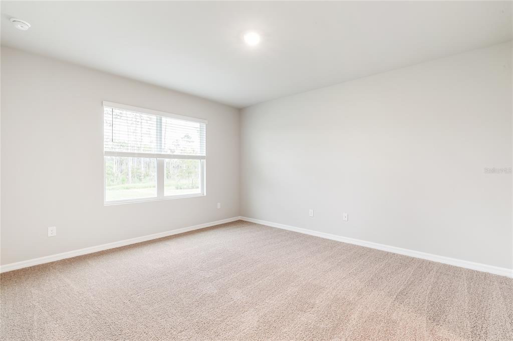 9504 Turtle Grass Circle Punta Gorda, FL 33950 - Photo 13 of 21 an empty room with a window