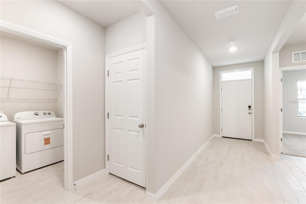 9504 Turtle Grass Circle Punta Gorda, FL 33950 - Photo 14 of 21 a view of a room with dryer and washer