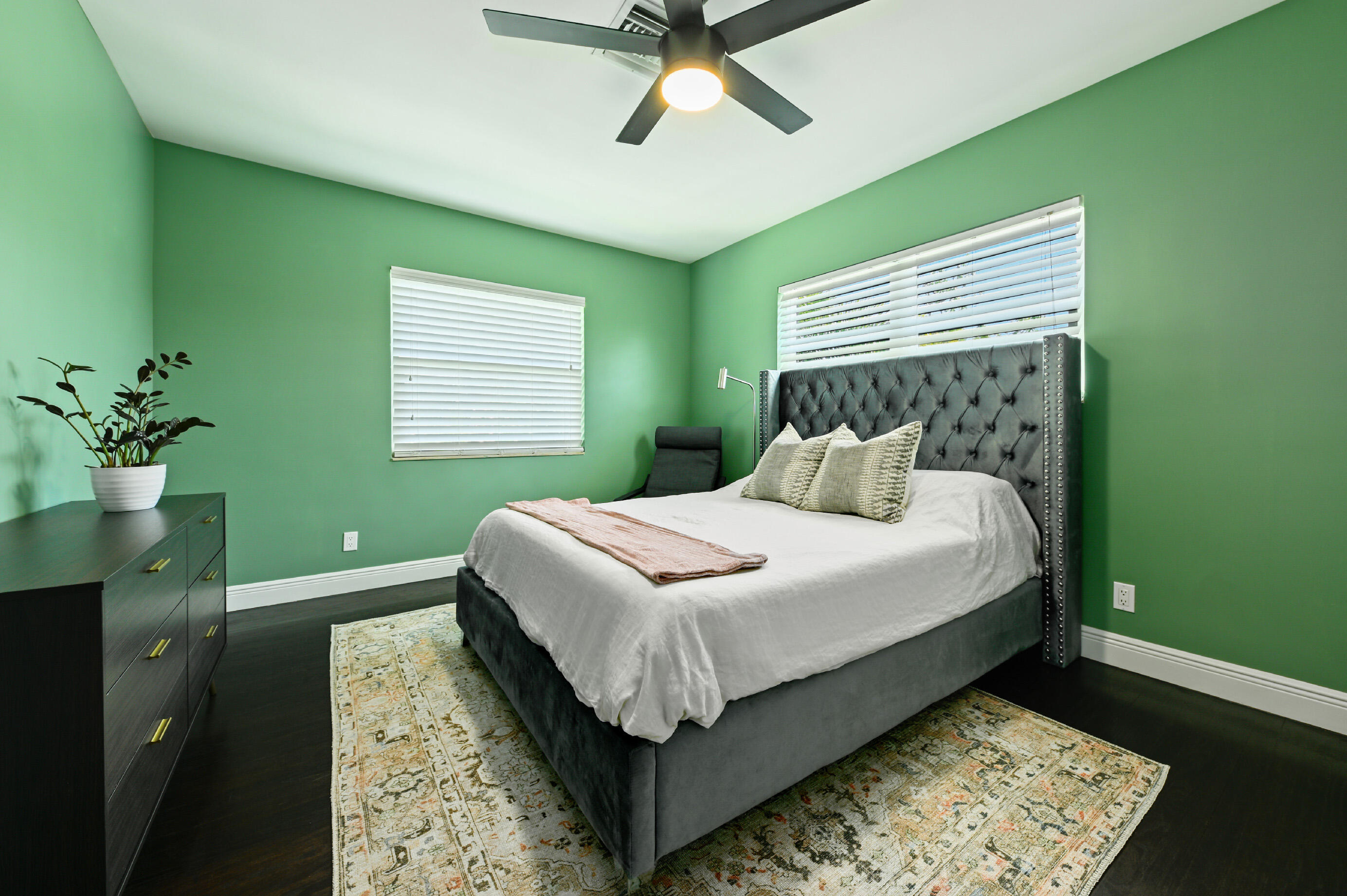 600 Mission Hill Road Boynton Beach, FL 33435 - Photo 22 of 42 a bedroom with a bed and a window