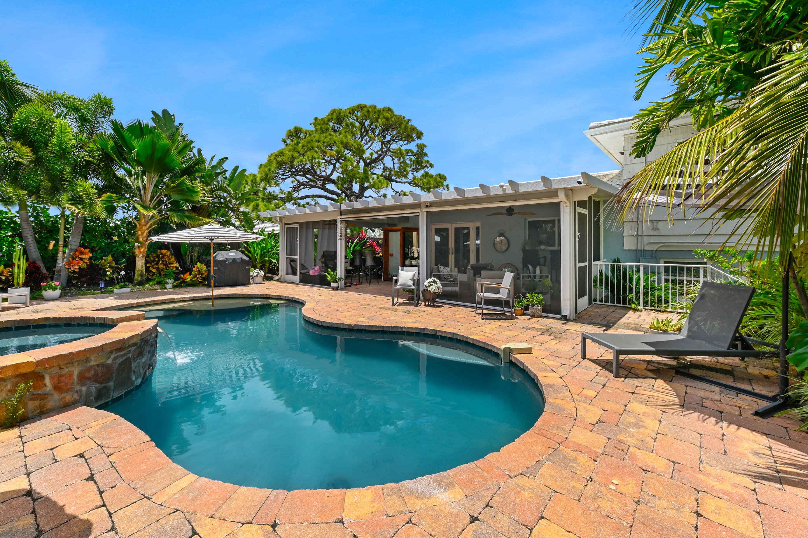 600 Mission Hill Road Boynton Beach, FL 33435 - Photo 26 of 42 a view of a swimming pool with lounge chair