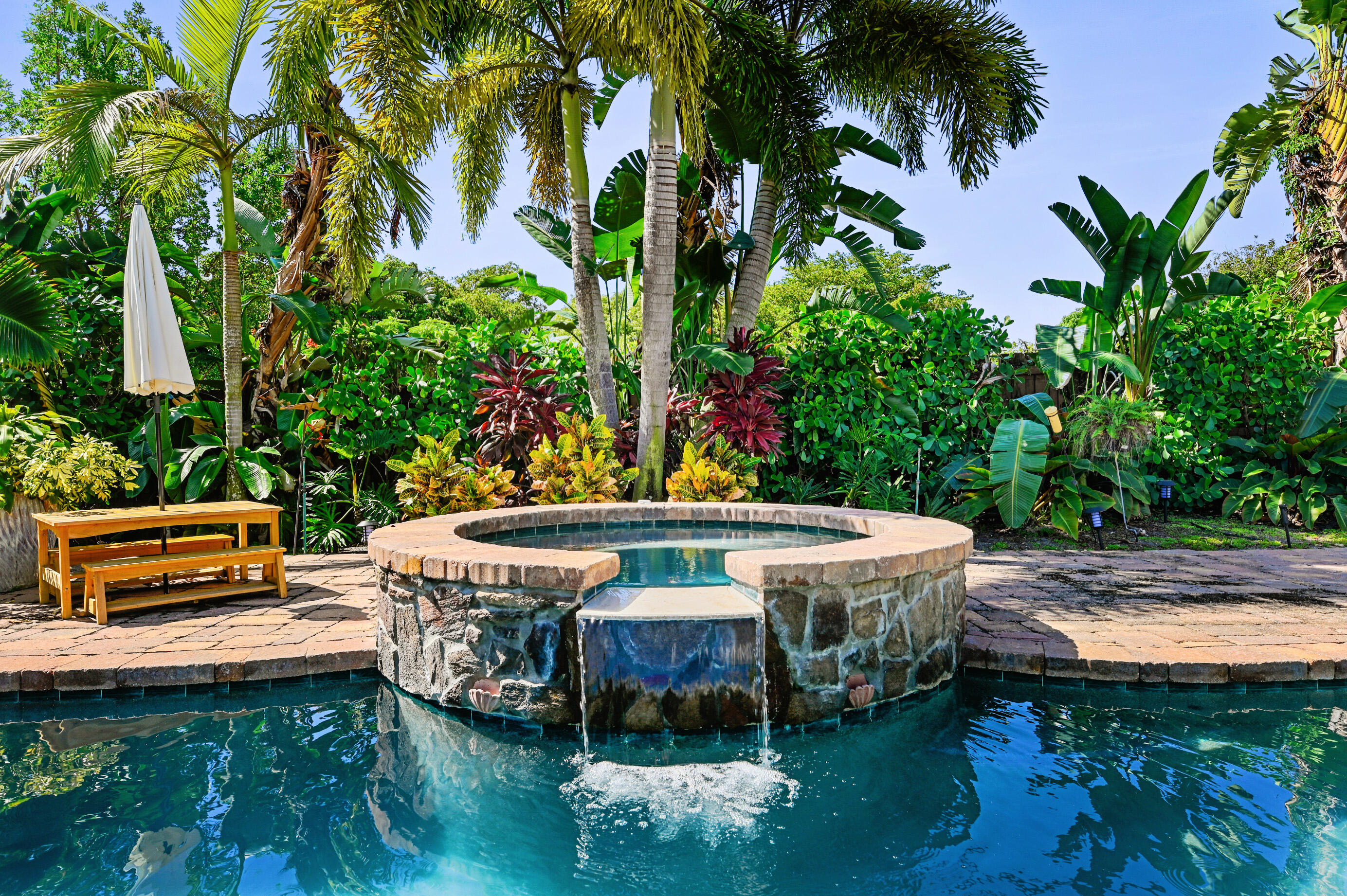 600 Mission Hill Road Boynton Beach, FL 33435 - Photo 27 of 42 a view of a swimming pool with a patio