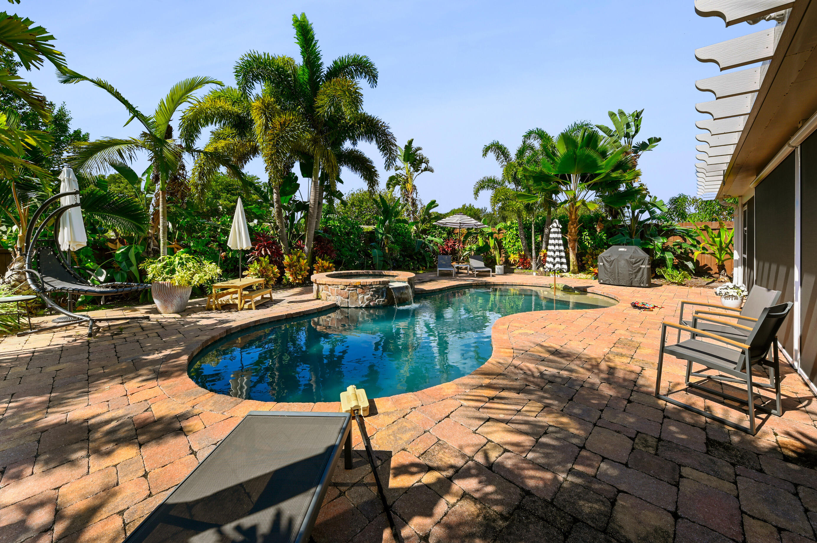 600 Mission Hill Road Boynton Beach, FL 33435 - Photo 29 of 42 a view of a swimming pool with a patio
