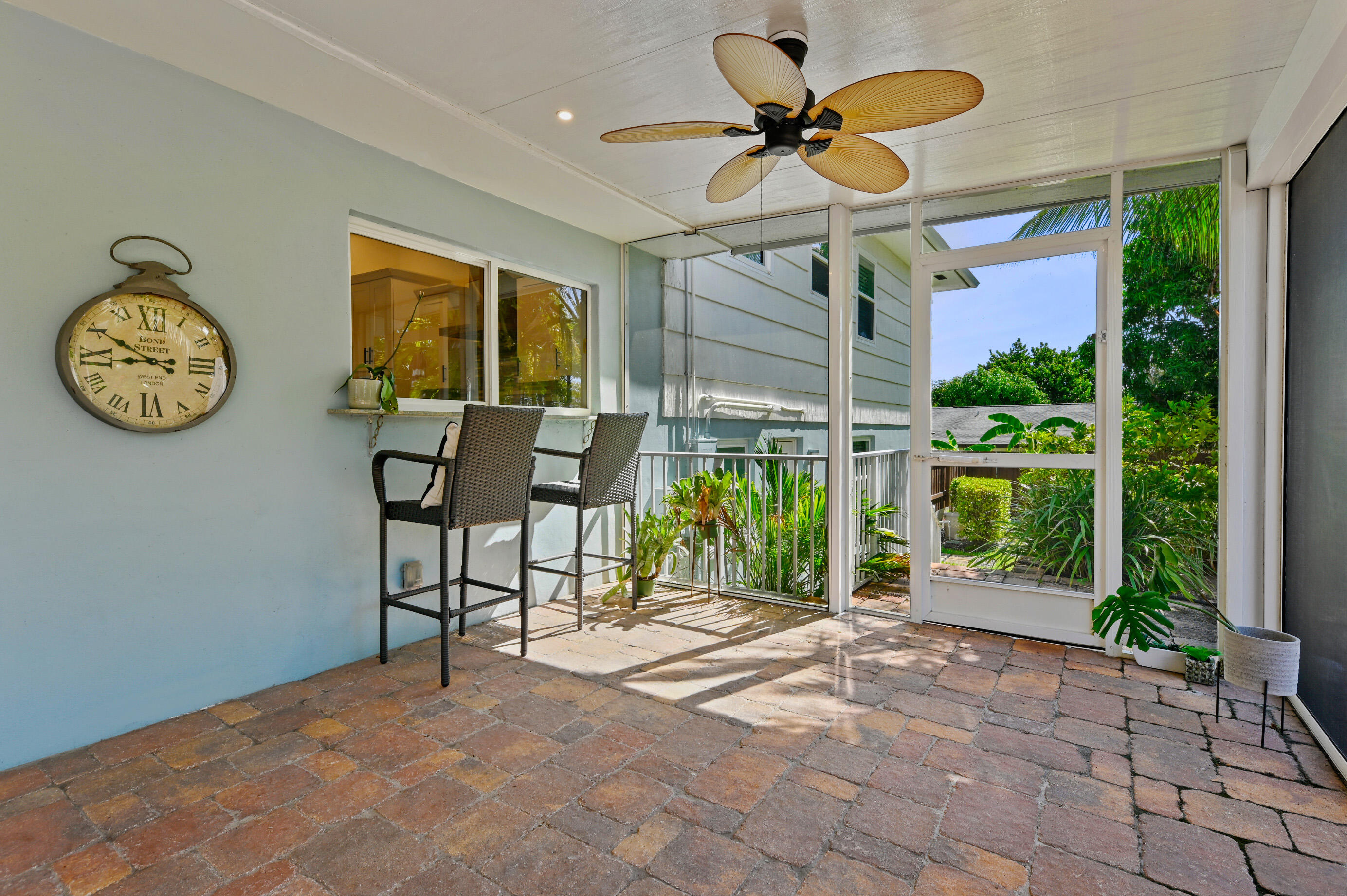 600 Mission Hill Road Boynton Beach, FL 33435 - Photo 33 of 42 a view of a livingroom with furniture and a floor to ceiling window