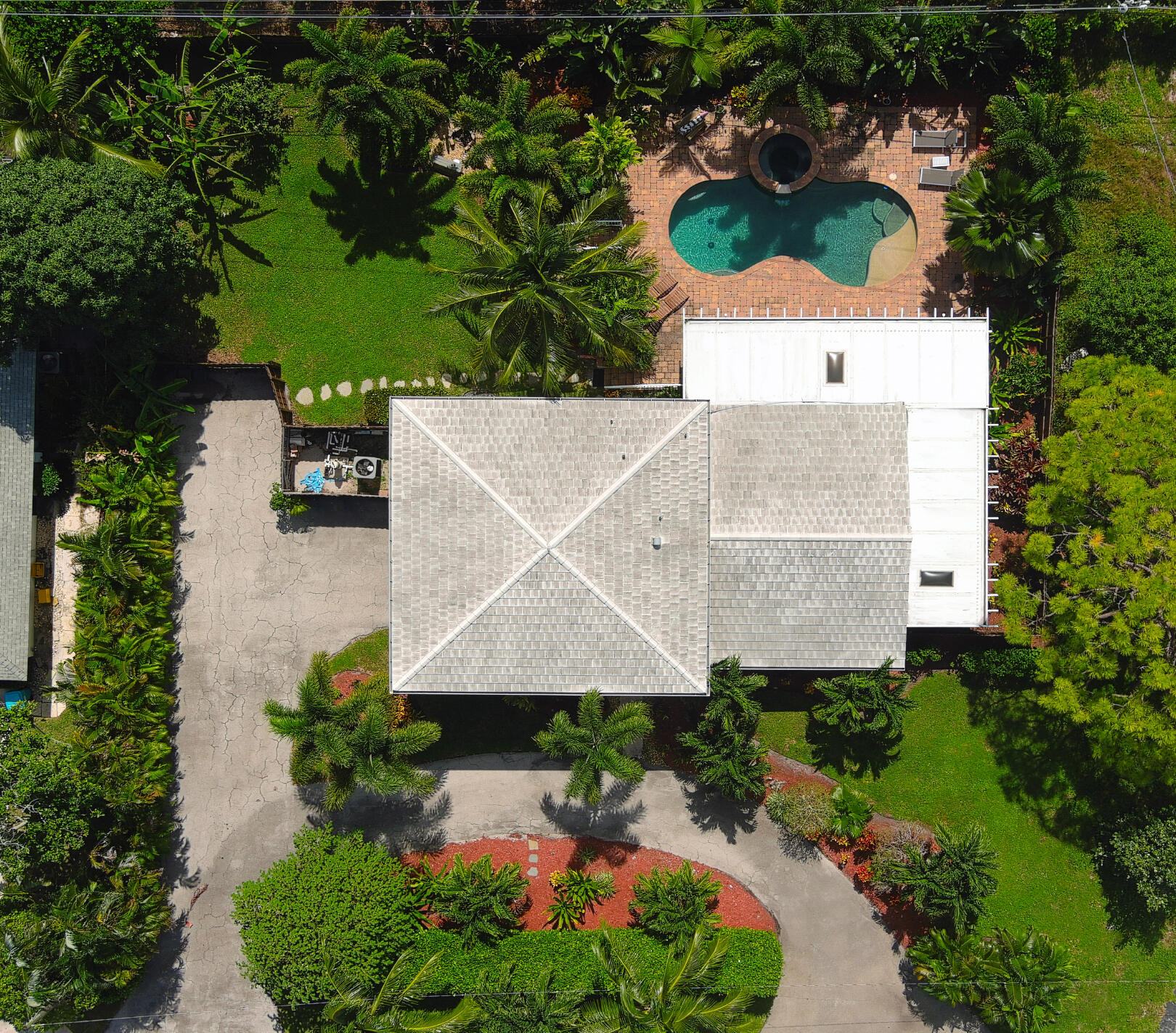 600 Mission Hill Road Boynton Beach, FL 33435 - Photo 6 of 42 an aerial view of a house with a swimming pool