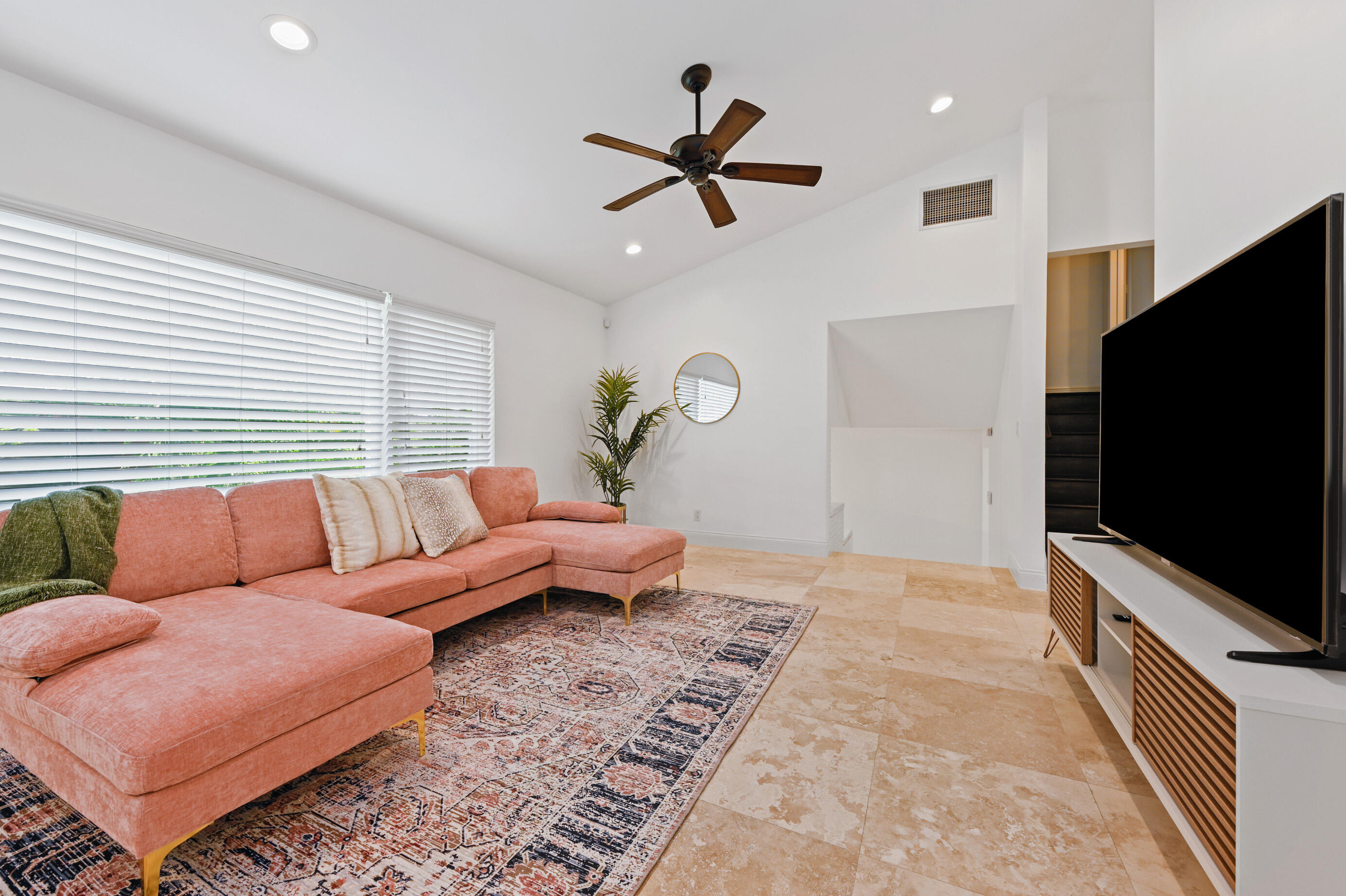 600 Mission Hill Road Boynton Beach, FL 33435 - Photo 9 of 42 a living room with furniture and a flat screen tv