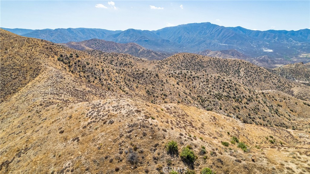 6 Calmgarden Road Acton, CA 93510 - Photo 3 of 8 a view of a large mountains with mountains in the background