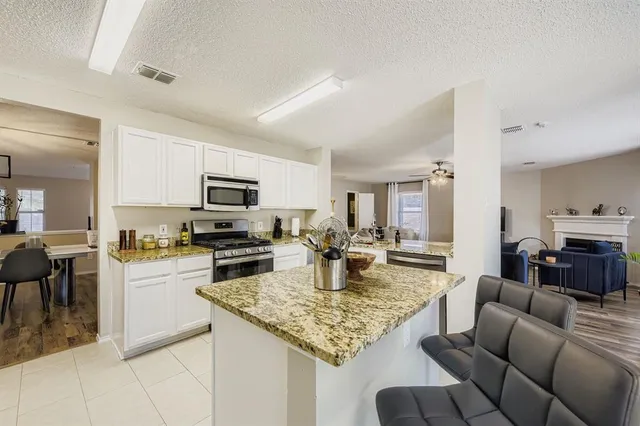 a view of a chairs in a patio