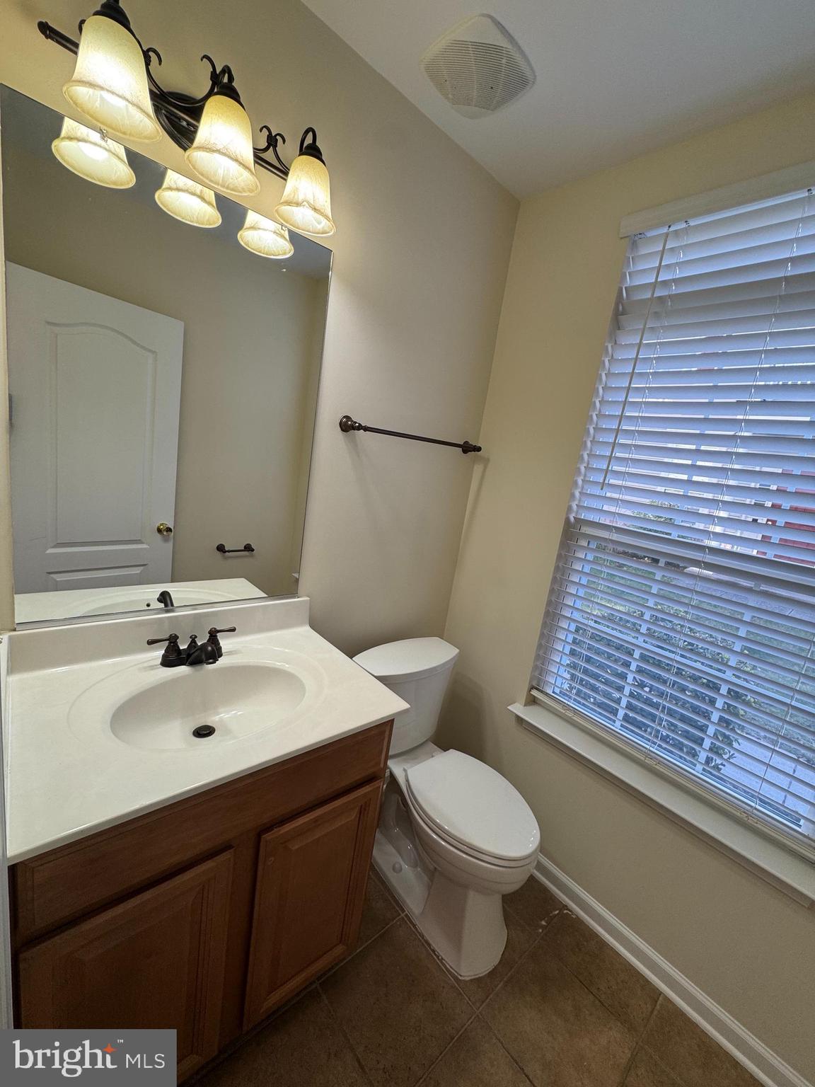 400 Kintyre Lane Stephens City, VA 22655 - Photo 12 of 33 a bathroom with a toilet sink and mirror