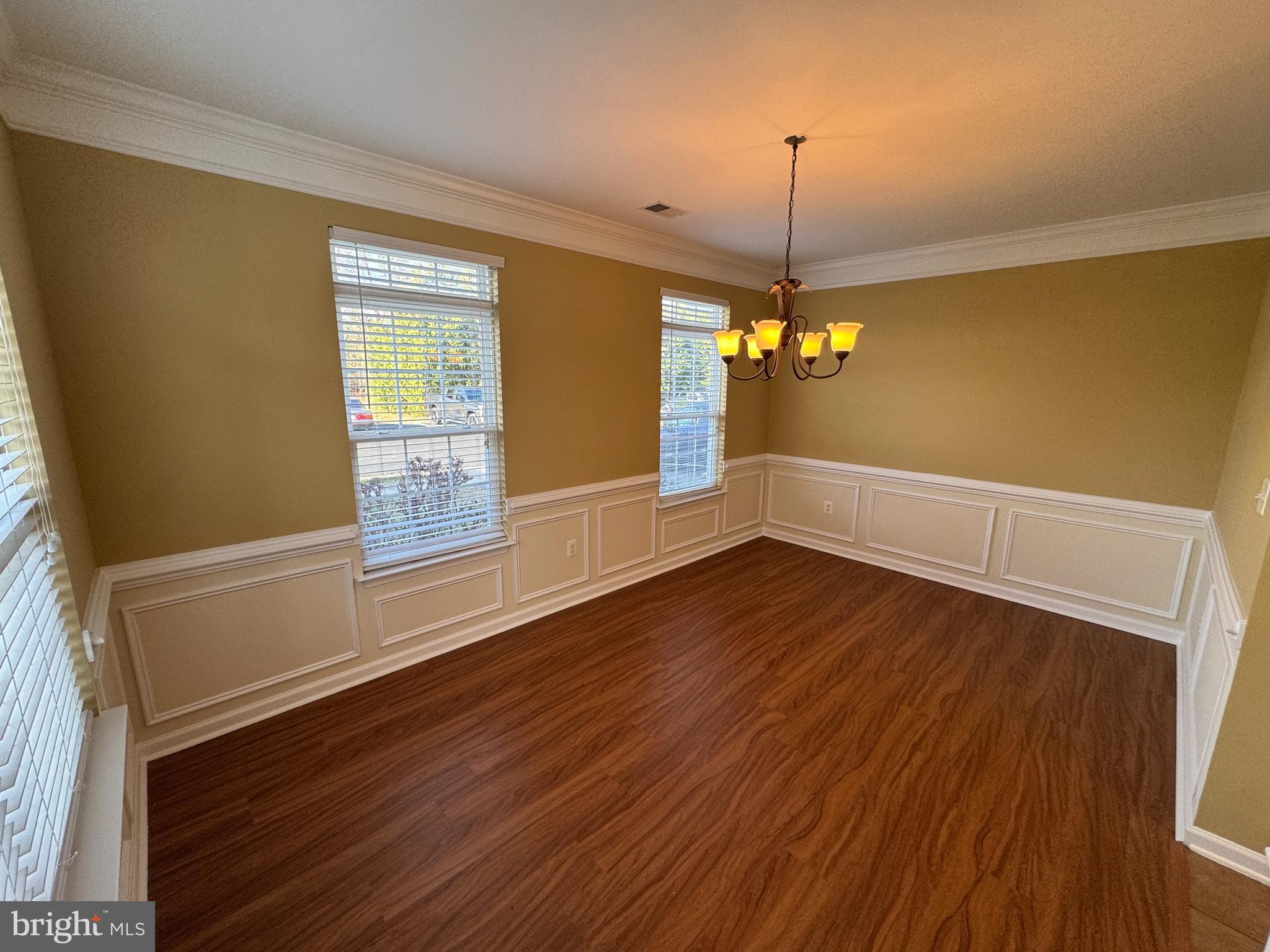 400 Kintyre Lane Stephens City, VA 22655 - Photo 14 of 33 a view of a room with wooden floor and chandelier